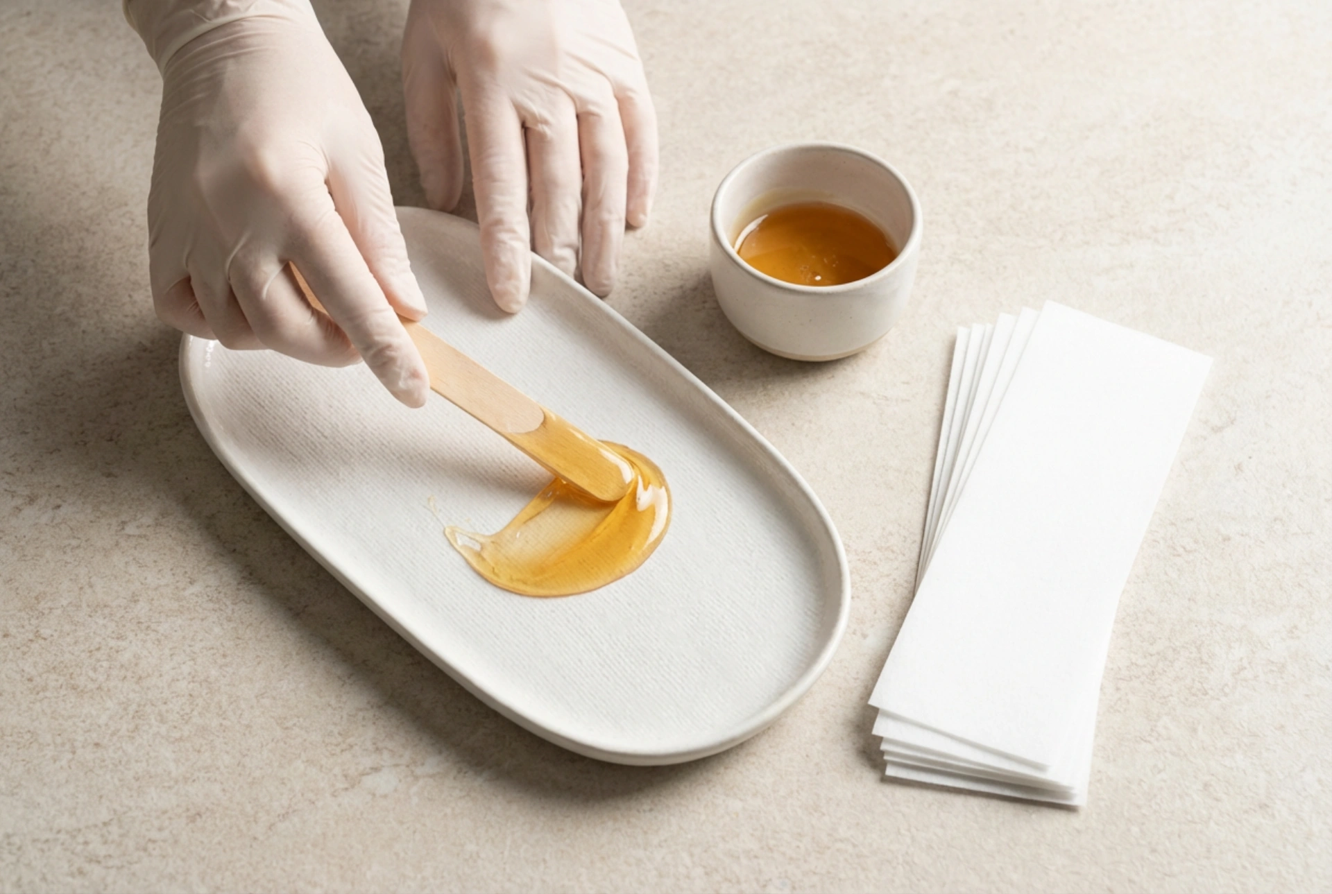 Voks for bikinilinjen: typer, temperatur og påføringsteknikk